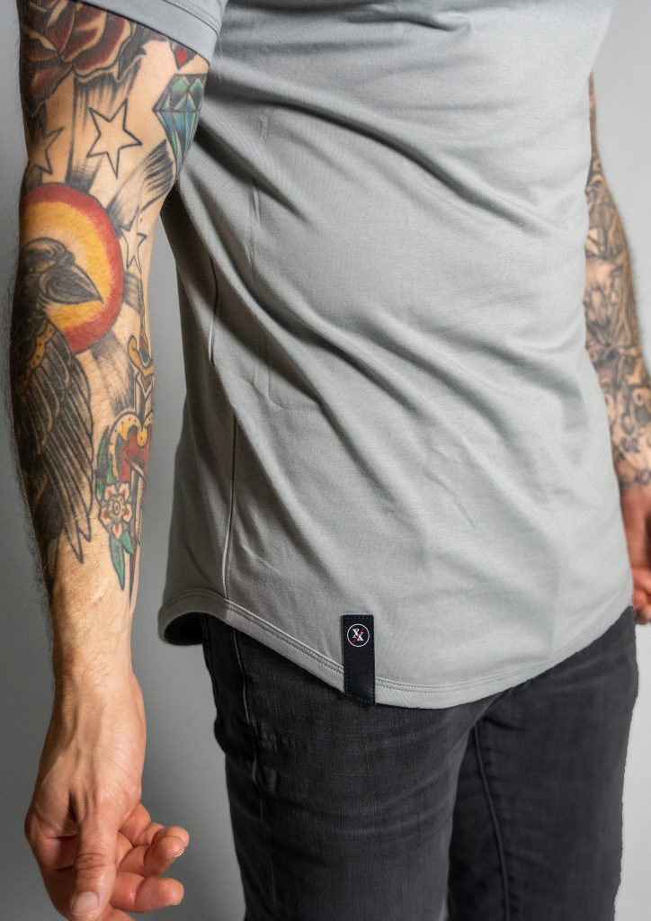 Breathable form fitting curved hem t shirt from ten10 apparel.