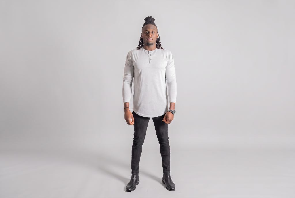 African American male long sleeve grey curved hem henley